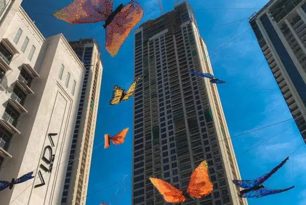 Poetic Kinetics' butterfly art piece Moments In Flight flying high over Dubai Creek Harbor
